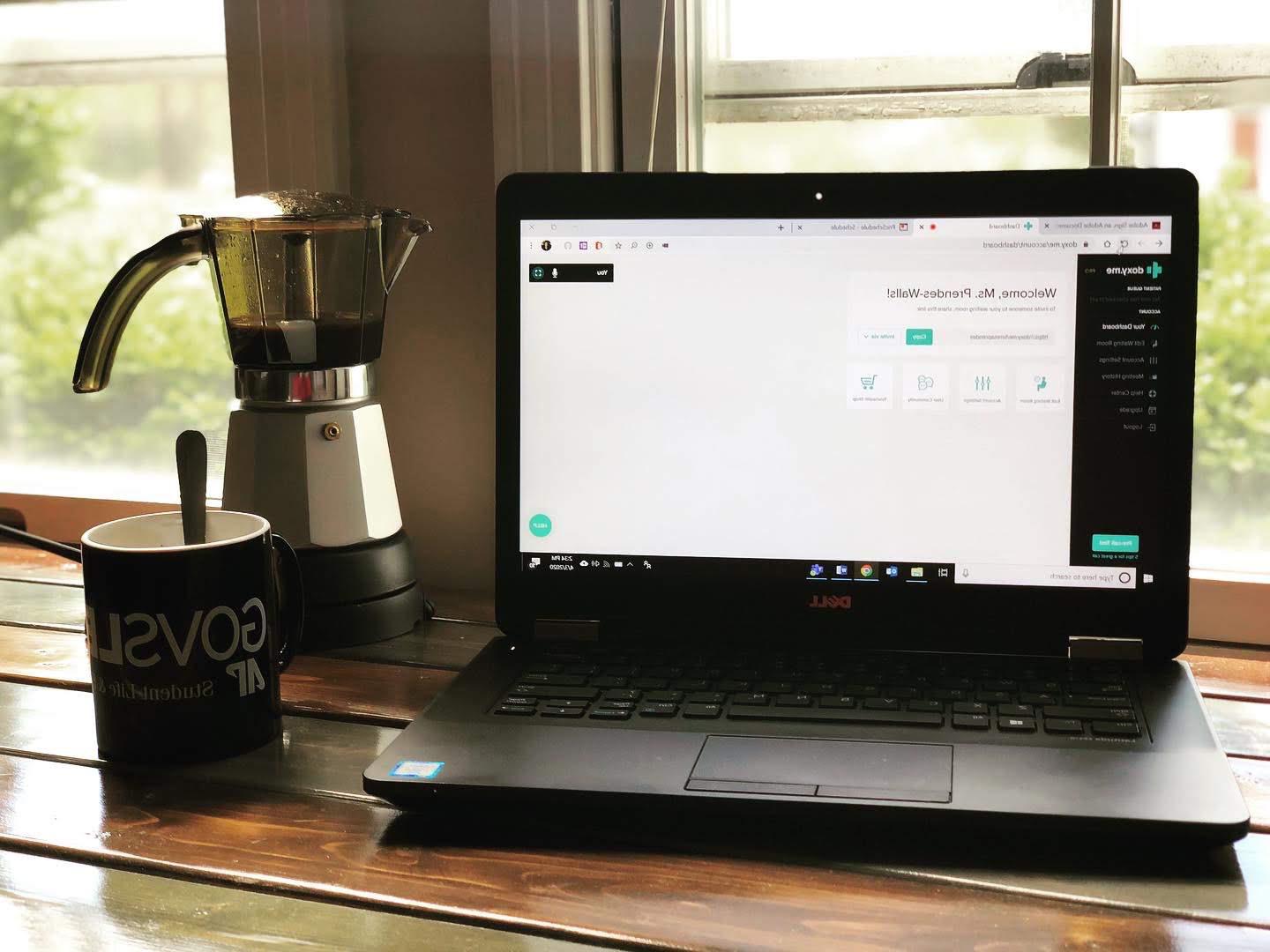 Laptop sits on table with health and counseling information open